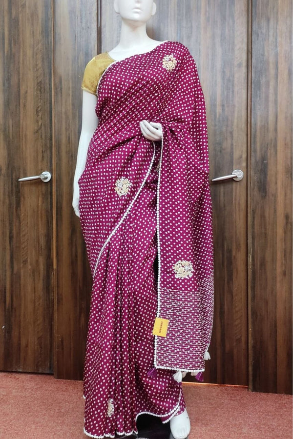 Bandhani Printed Silk Saree In Magenta Color