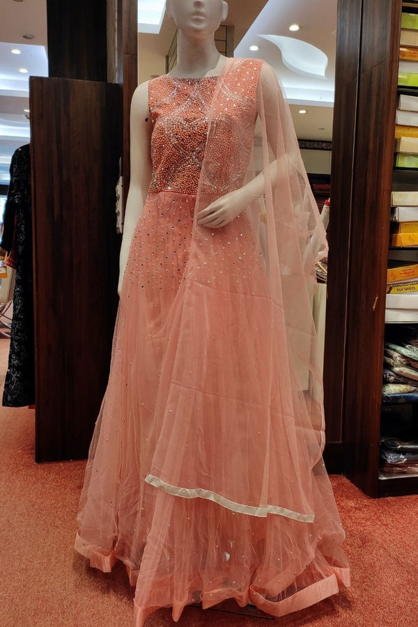 Gown In Net Fabric With Pearl Embroidered Yoke In Peach Colour