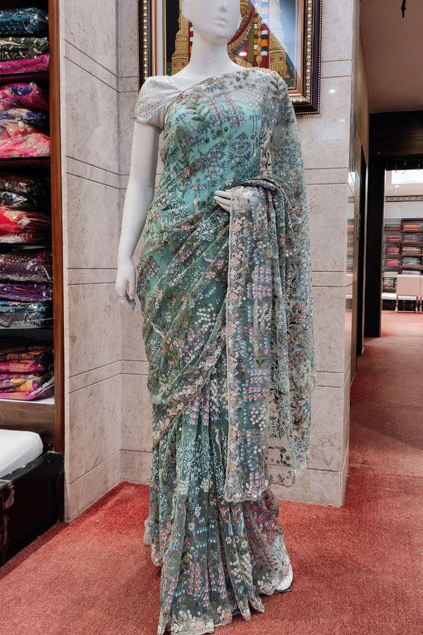 Saree With Thread Embroidered In Net Fabric